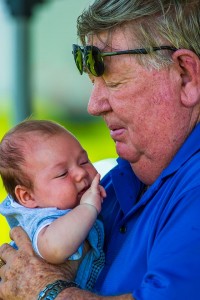 Russ holding his great grandson Charlie.