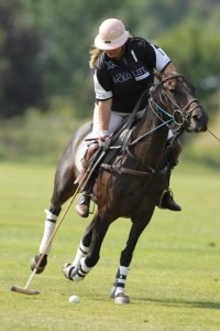 Melissa Ganzi of Hawaii Polo Life controls the ball during her drive to goal. Photo by Louisa Davidson