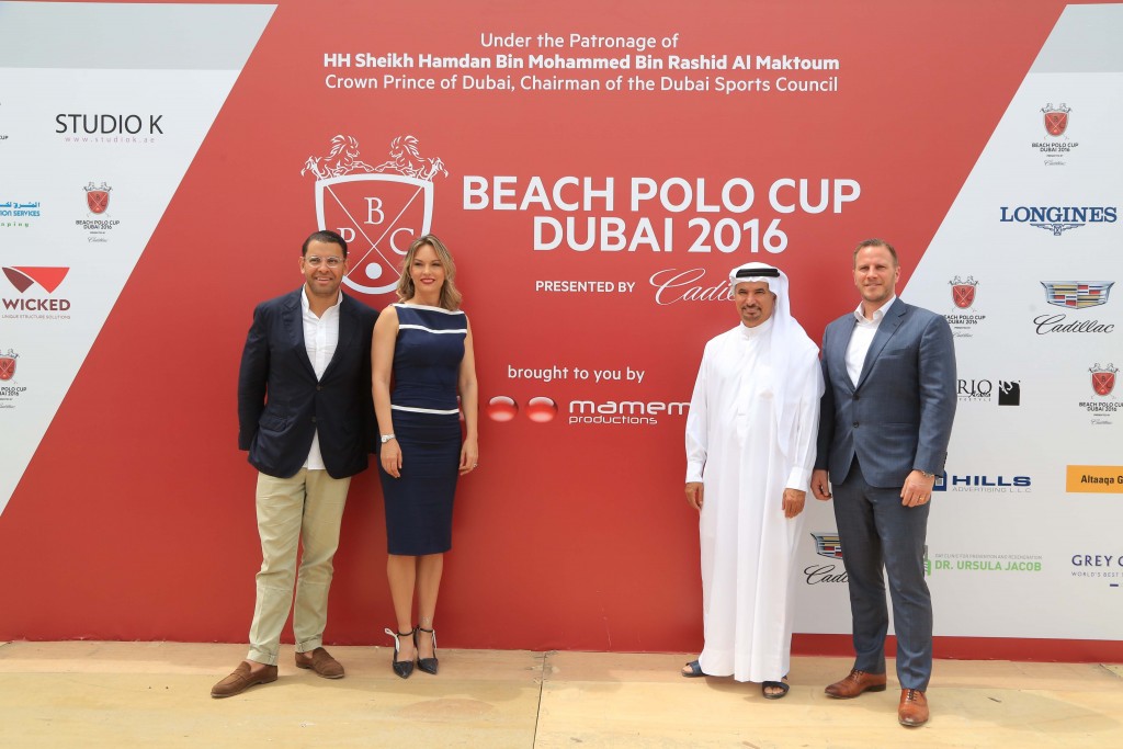 Sam Katiela, Managing & Creative Director of mamemo productions and founder & organiser of the Beach Polo Cup Dubai; Gaby Katiela, Event and Tournament Director of mamemo productions; His Excellency Saeed Hareb, Secretary General, Dubai Sports Council and Felix Weller, Managing Director, Cadillac Middle East, the presenting sponsor of the event.