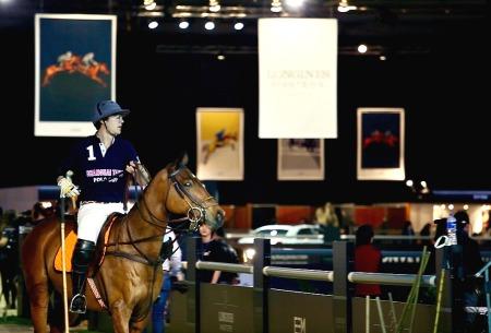 (Brieuc Rigaux entering the arena under the colors of the Longines Masters - ©Shanghai Tang)