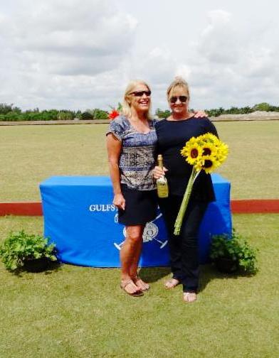 Maggie Mitchell of the USPA presented general manager Marla Connor with flowers and champagne. Photo: Catherine Zachariadis.