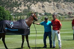 MVP Julio Novillo Astrada with Best Playing Pony, Diva.  (Photo by ChukkerTV)